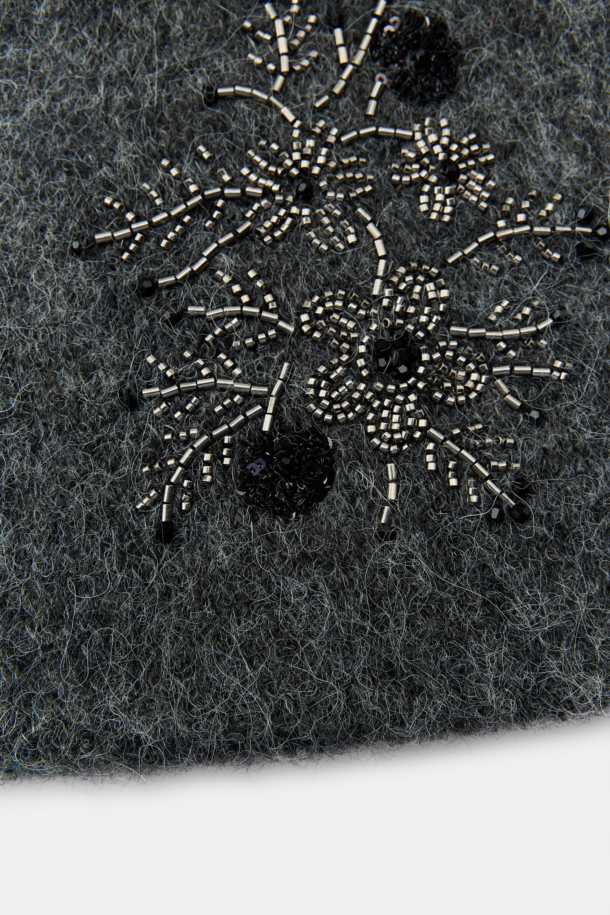 KNIT SCARF WITH EMBROIDERED FLOWERS AND BEADS